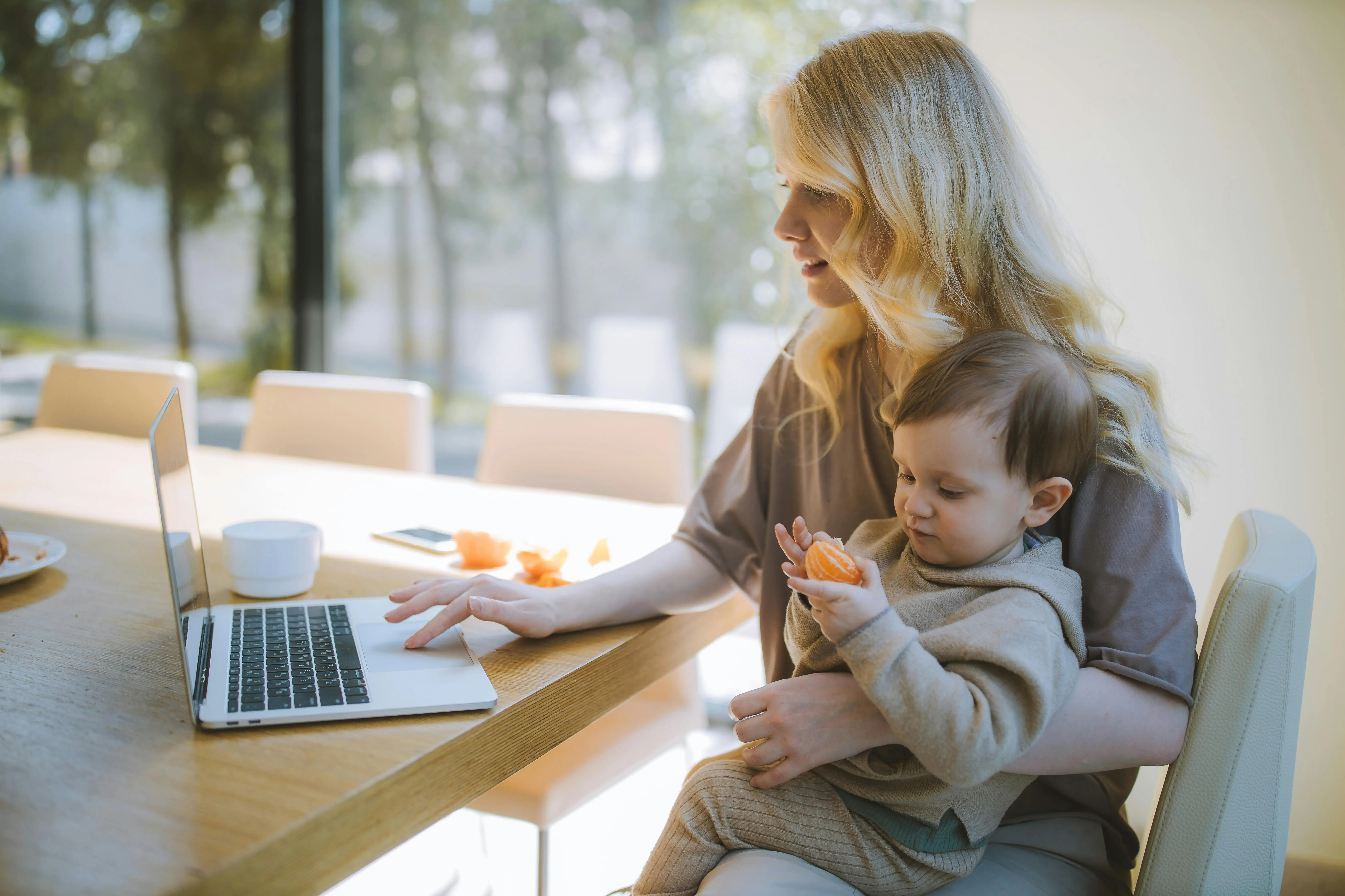 Mother and child working at home